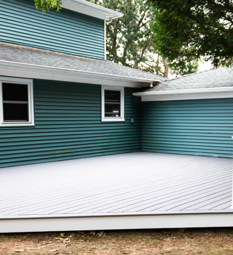 a newly painted sidings and a newly installed deck